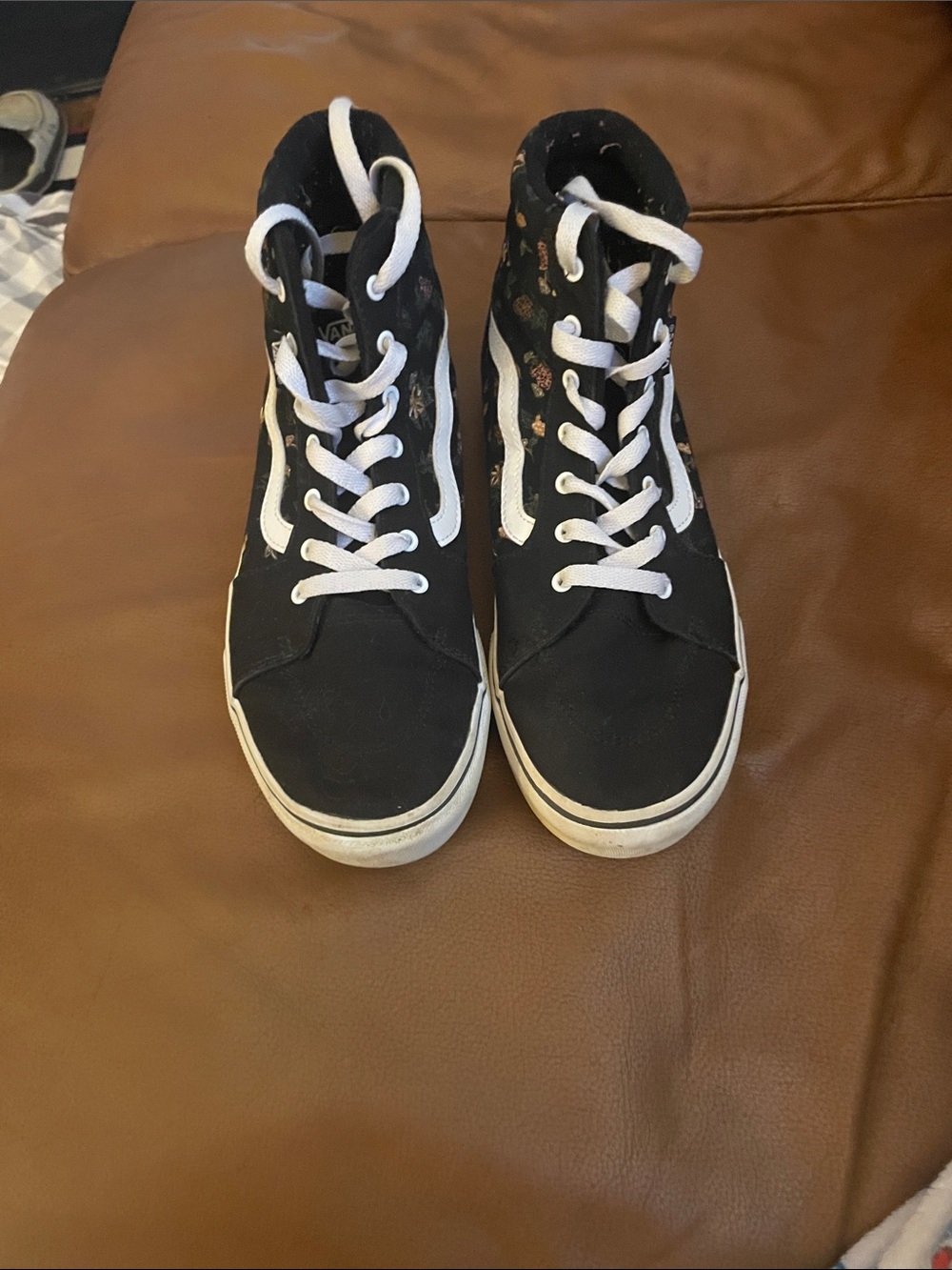 Vans Black High-Top Sneakers with White Stripe and floral accents